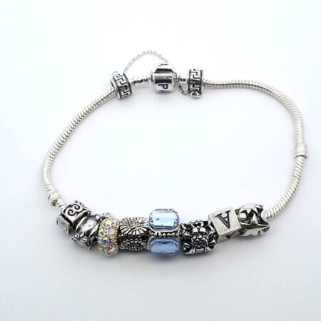Snake Chain with 9 Charms 9 Inch Bracelet 35.1 Grams